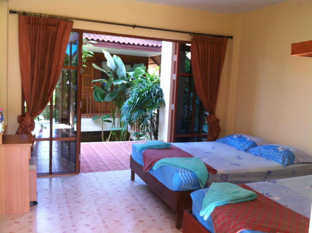 Haad Yao Sunset Bungalow Pokoj fotografie